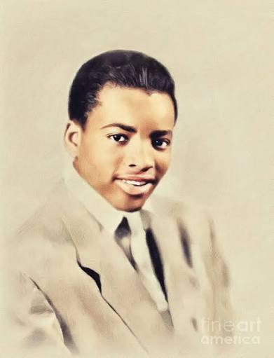 Vintage portrait of Titus Turner in a light suit and tie, smiling at the camera